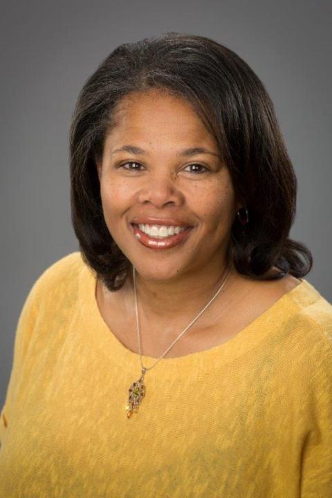 Headshot of Kim Thompson