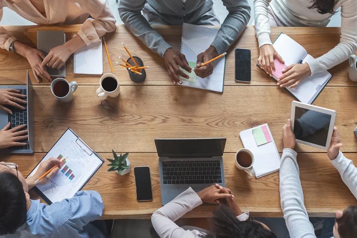 Business people at a table Collaborative group of advisors