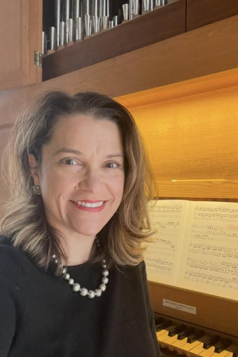 woman in front of piano