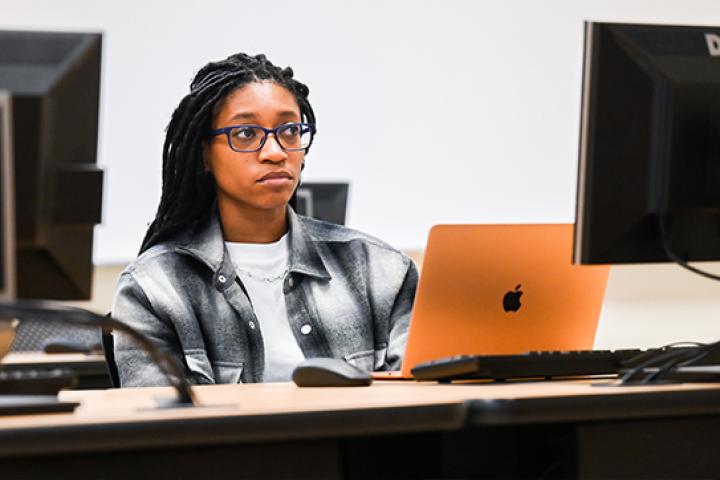 Computer Science - Cyber Security A photo of a female student studying cyber security