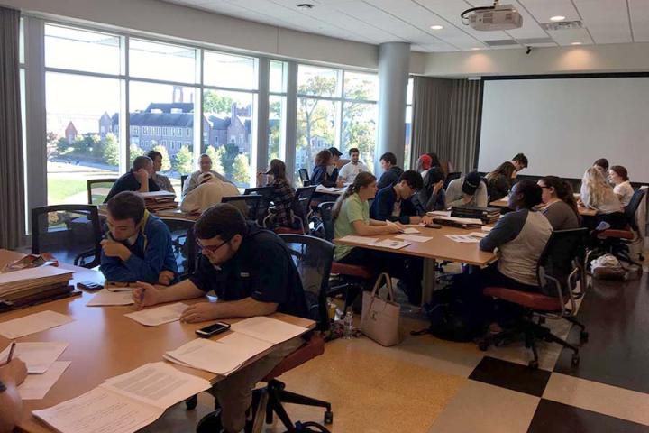 Students in Professor Eckelmann’s HIST 3475: Modern Civil Rights Struggle class working with Special Collections' resources in Fall 2018 