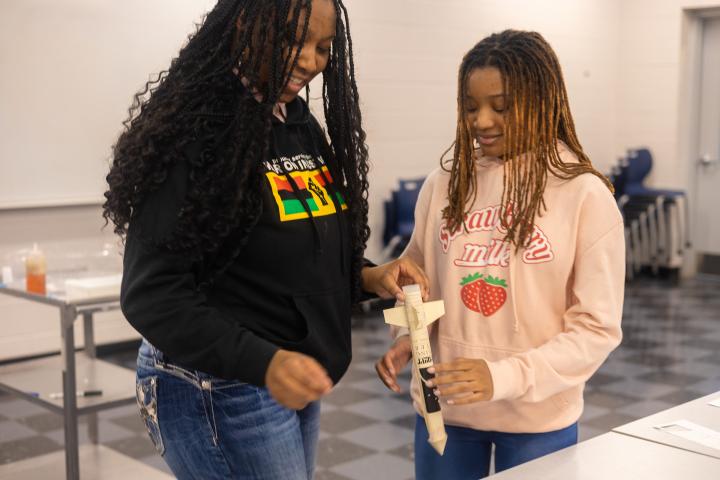 Young Women's Leadership Academy students build a rocket