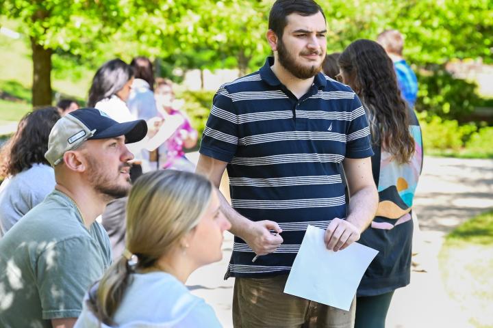 Students collaborating with faculty