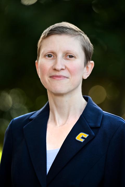 LaDonna Spruill in a blue jacket and white shirt.