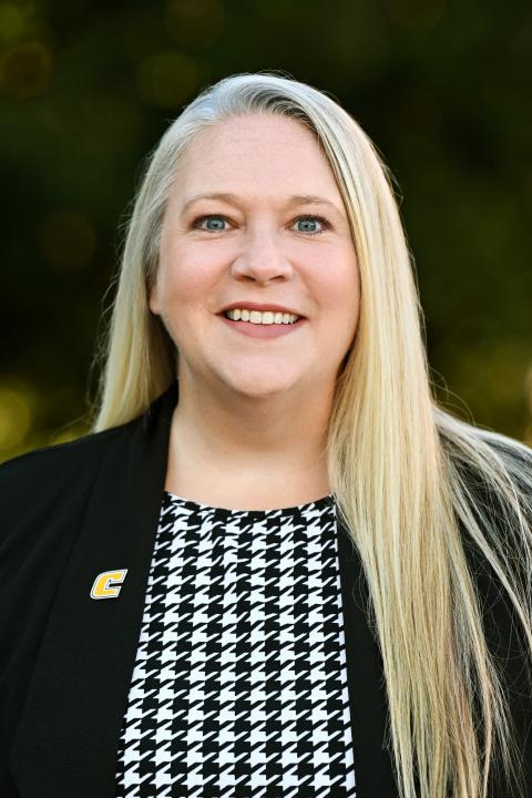 Erin Ryan had long blond hair. 