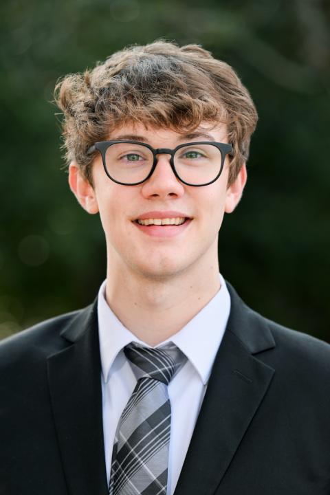Headshot of Chandler Mason smiling