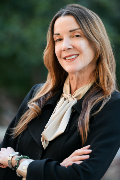 Dr. Heather Palmer in a black blazer