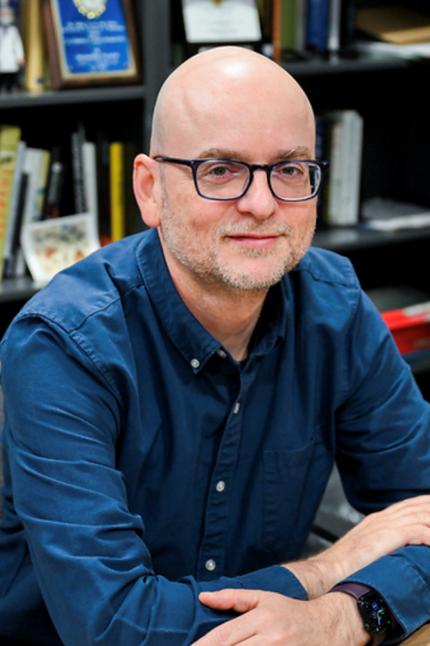 Headshot of Dr. Stylianos Chatzimanolis in his office