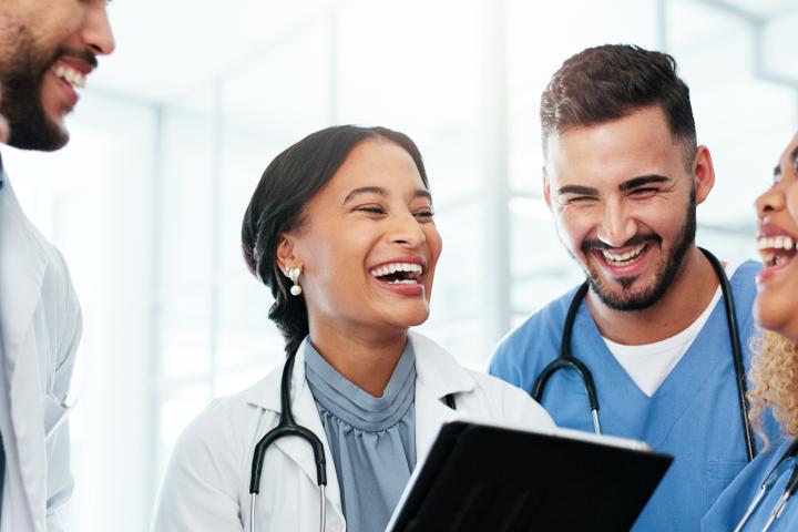 CMA and doctors talk happily at the hospital