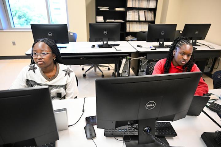 Students participate in iCompBio training Wednesday, May 20, 2026 in the Engineering and Computer Science building.  Student with Yingfeng Wang is Amber Deamer Jannatul Ferdoush