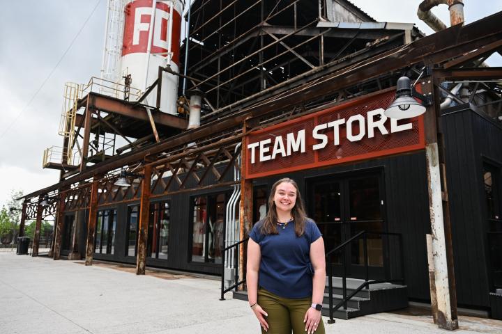 RCOB alum Kylie Sanders stands outside the Team Store at Erlanger Park, home of the Chattanooga Lookouts. 