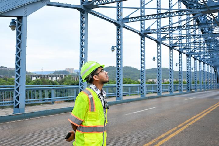 TDOT interns Nishat Tasnim, (female) and Kironmoy Paul Shourov, (male) stand Sunday, June 7, 2026 on the Market Street Bridge during testing of the draw bridge. Both are graduate students in Civil Engineering.