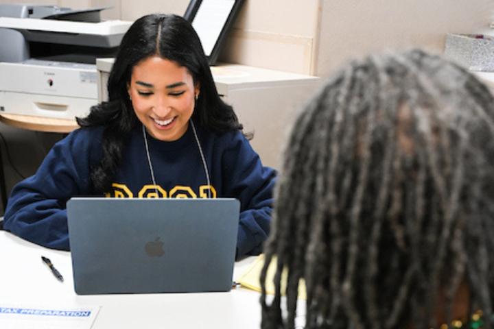 RCOB student working with MobileMOC to provide free taxes through VITA at local senior centers