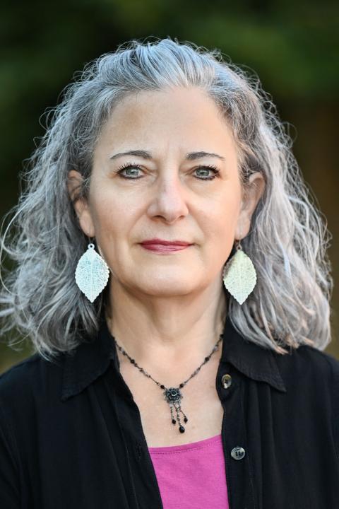 Professional headshot of Christine Estoye