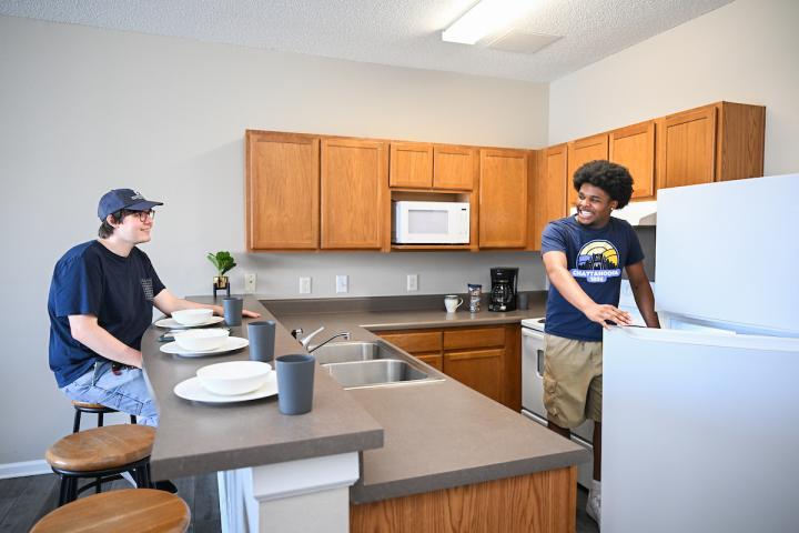 Two students in the kitchen of Guerry