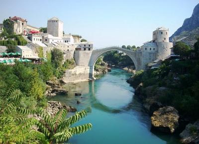Bosnia Balkans White castle bridge over water in Balkans