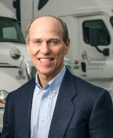 David Parker David Parker in front of semi trucks