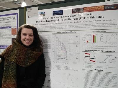 Alex Waters at MRS 2017 Student stands in front of poster