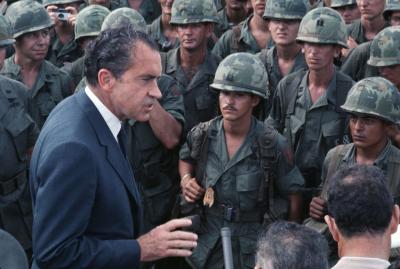 President Nixon speaks with US combat infantrymen during the Vietnam War
