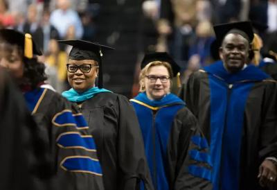 Graduates walking the aisle