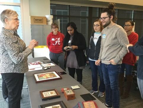 Students looking at desk