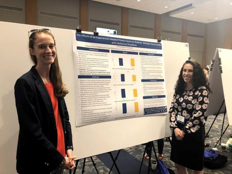 Students in front of Scientific Poster