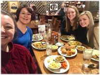 Group of women eating in a restaurant