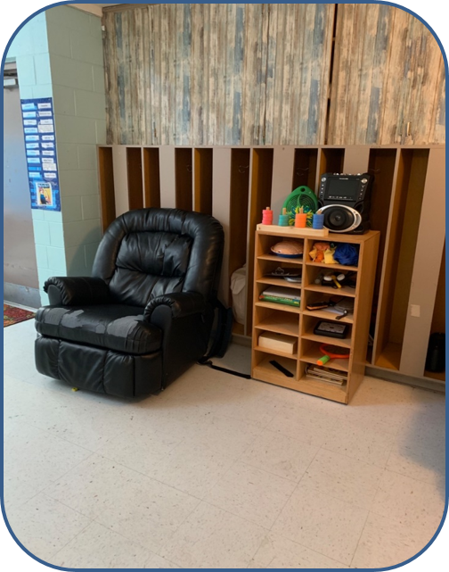 Couch and wall of interactive classroom