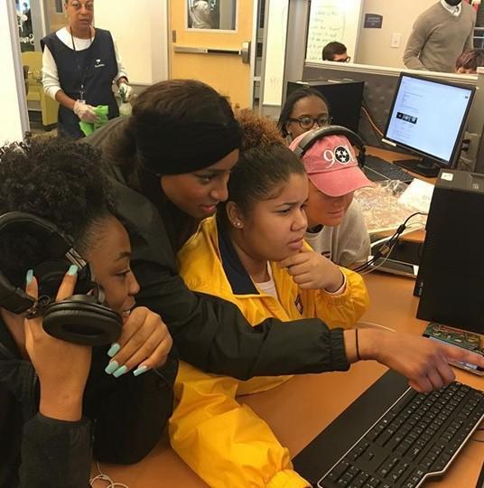 Students around a computer