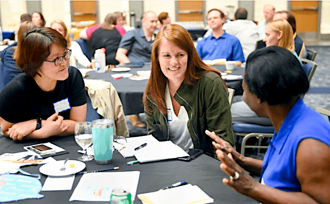 group of instructors at a table