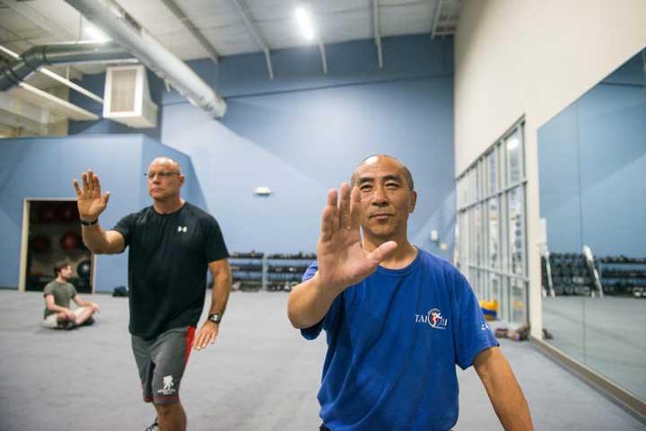 Men doing tai chi