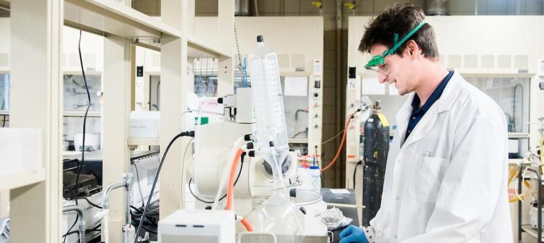 Chemistry student in lab with goggles