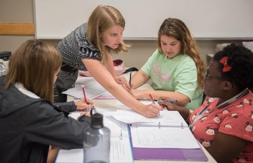 professor helping students