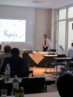 Man gives presentation on Physics in front of audience