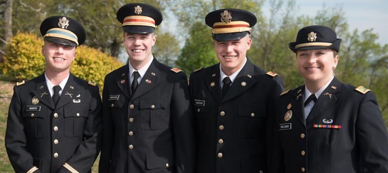 Four scholarship recipients standing together