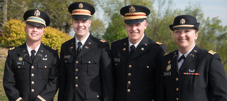 Four scholarship recipients standing together 