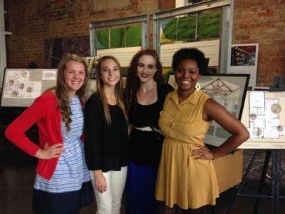 4 female students taking group photo