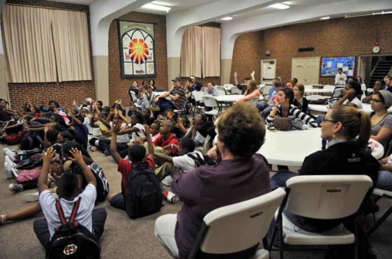 PAWS meeting with lots of people in a large room