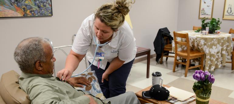 Nursing student takes blood pressure