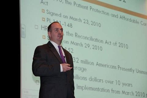 Man presenting at 2011 PT Forum 