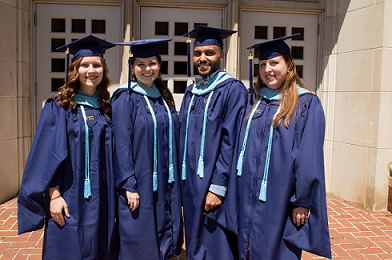 4 gradutes group photo