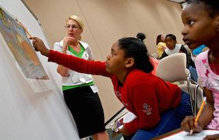 Students interacting in a classroom setting