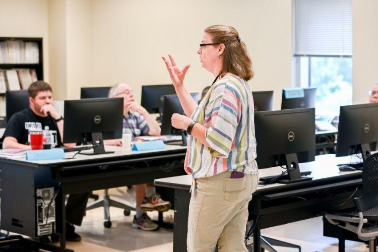 An AP Computer Science Instructor presenting a lecture