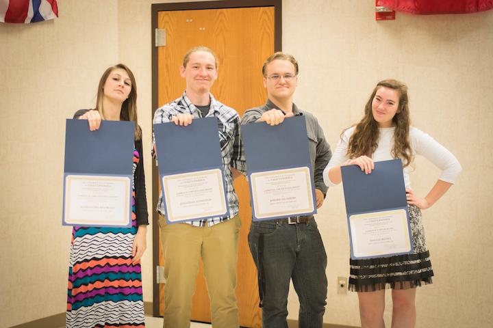 Geology Students Holding Certificates