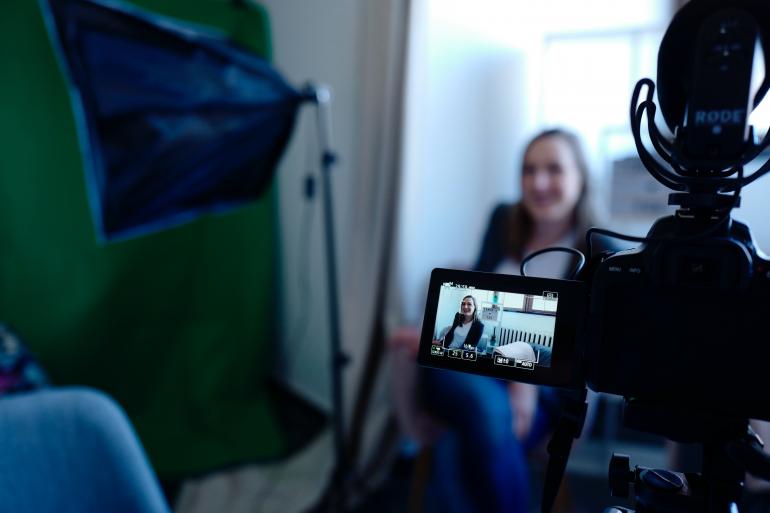 Shot of woman from behind camera