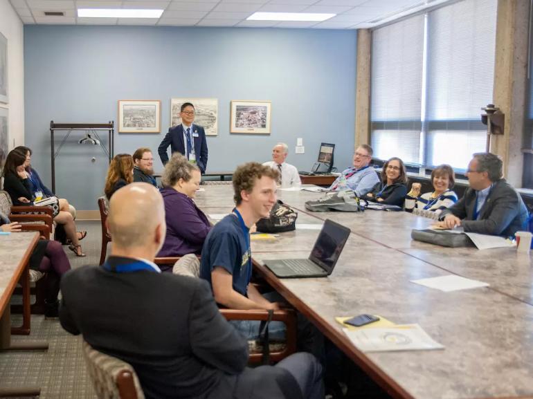 a meeting at the university center heritage room