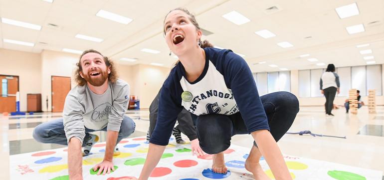 Students playing twister