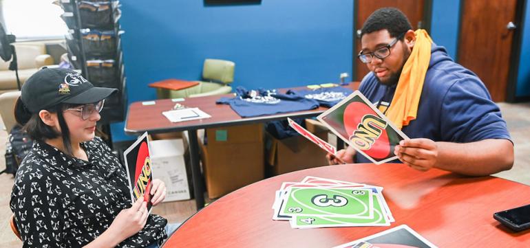 Students playing Uno