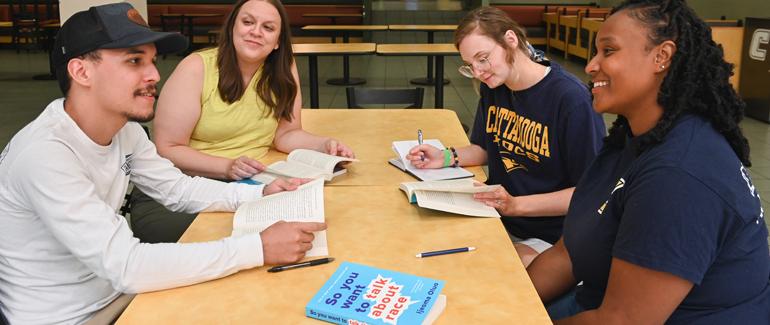 Read to Achieve Students at a table