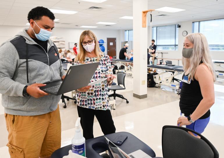 OTD students with Dr. McDonald in lab